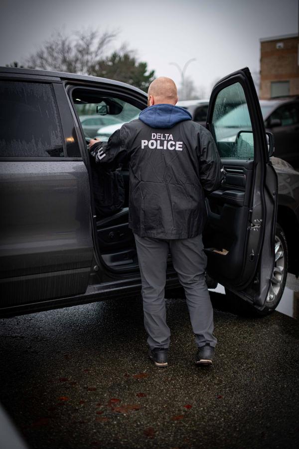 Plain clothes officer in police jacket